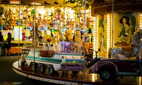 vehicle carousel on carnival at night